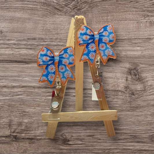 Daisy Bow Badge Reel