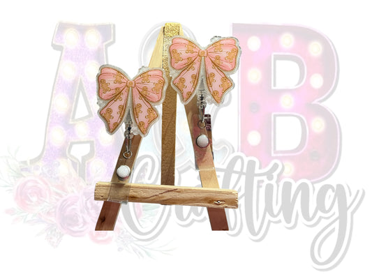 Pink Gingerbread Bow Badge Reel