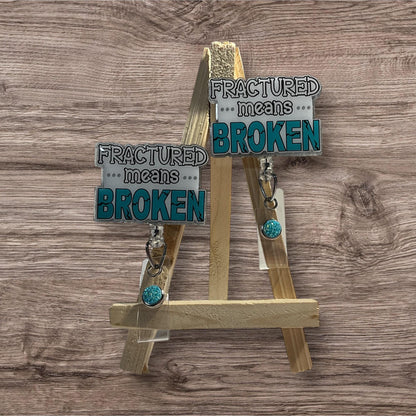 Fractured Means Broken Badge Reel