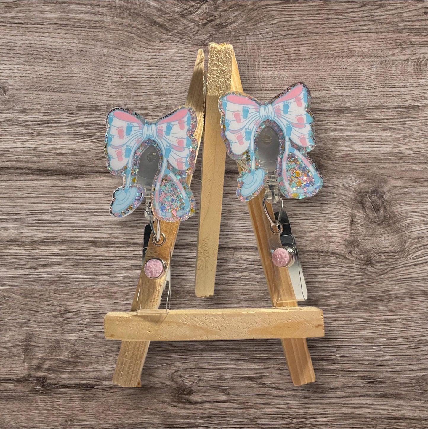 Pink and Blue Baby Feet Bow Badge Reel